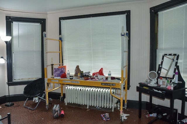 40 Chapel St, Augusta, ME 04330 - garage with radiator heating unit and wallpapered walls