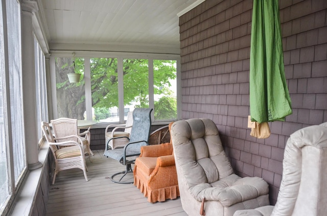 40 Chapel St, Augusta, ME 04330 - sunroom / solarium featuring ornamental molding and hardwood / wood-style flooring