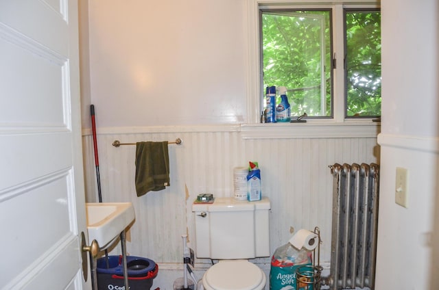 40 Chapel St, Augusta, ME 04330 - half bath with radiator and a wainscoted wall