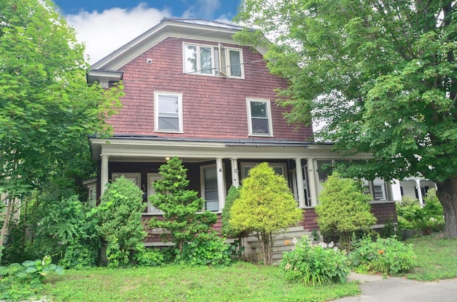 40 Chapel St, Augusta, ME 04330 - view of front facade featuring covered porch