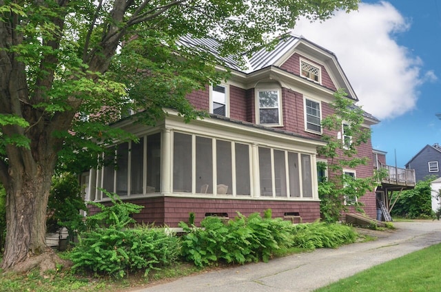 40 Chapel St, Augusta, ME 04330 - view of front of property with a sunroom