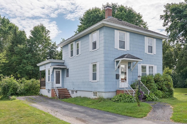 15 Huston Ave, Auburn, ME 04210 - traditional style home featuring a chimney and a front lawn