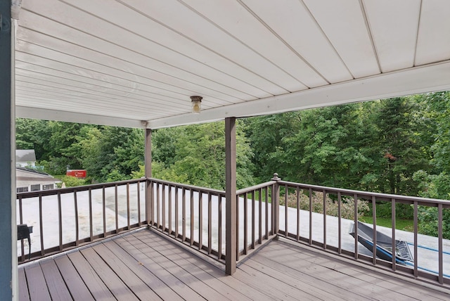 15 Huston Ave, Auburn, ME 04210 - wooden deck with view of scattered trees