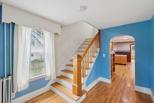 15 Huston Ave, Auburn, ME 04210 - staircase featuring arched walkways and wood finished floors