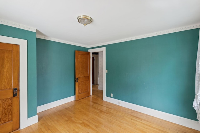 15 Huston Ave, Auburn, ME 04210 - empty room with light wood-style floors and baseboards