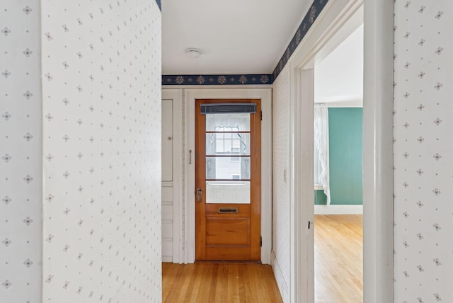 15 Huston Ave, Auburn, ME 04210 - corridor featuring wallpapered walls and light wood-type flooring