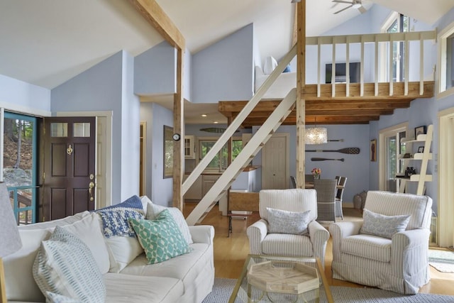 127 Appalachee Rd, Boothbay Harbor, ME 04538 - living room featuring a ceiling fan, wood finished floors, high vaulted ceiling, beam ceiling, and stairs