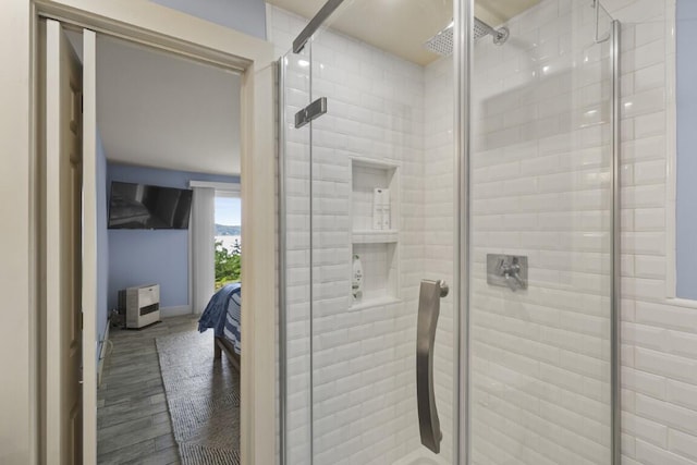 127 Appalachee Rd, Boothbay Harbor, ME 04538 - ensuite bathroom with a shower stall and wood finished floors