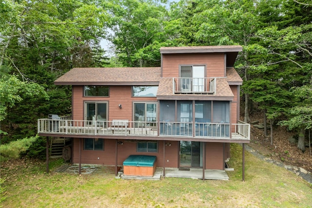 127 Appalachee Rd, Boothbay Harbor, ME 04538 - back of property featuring a hot tub, a balcony, stairway, a lawn, and a deck
