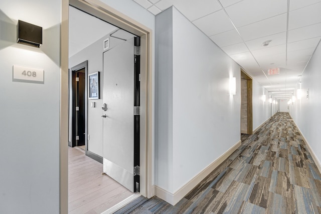 218 Washington Ave Unit 408, Portland, ME 04101 - corridor with a paneled ceiling and wood finished floors