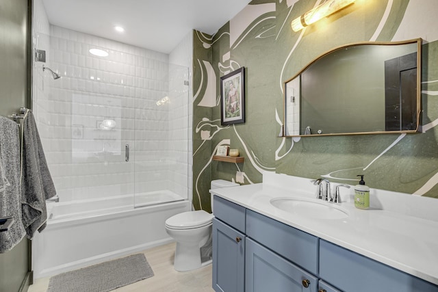 218 Washington Ave Unit 408, Portland, ME 04101 - bathroom with vanity, enclosed tub / shower combo, wood finished floors, and recessed lighting