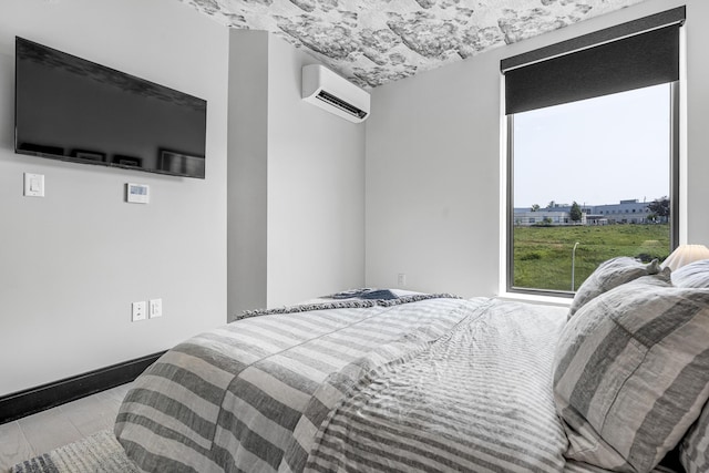 218 Washington Ave Unit 408, Portland, ME 04101 - bedroom featuring a wall mounted AC