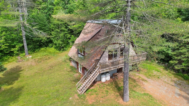 36 Palmer Rd, Etna, ME 04434 - aerial view of property and surrounding area featuring a heavily wooded area
