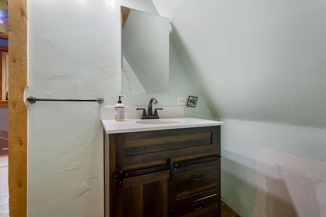 36 Palmer Rd, Etna, ME 04434 - bathroom featuring vanity and vaulted ceiling