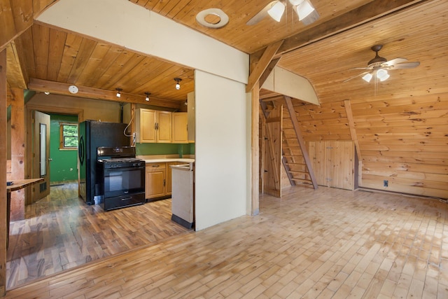 36 Palmer Rd, Etna, ME 04434 - kitchen featuring gas stove, ceiling fan, wooden ceiling, light countertops, and light wood-style floors