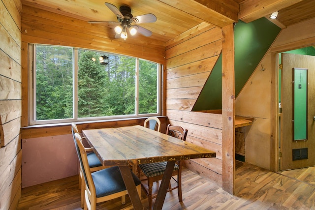 36 Palmer Rd, Etna, ME 04434 - dining room featuring wooden walls, ceiling fan, wood finished floors, and wood ceiling