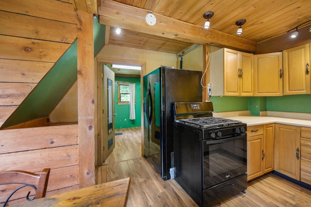36 Palmer Rd, Etna, ME 04434 - kitchen with black appliances, light wood-type flooring, wood ceiling, light countertops, and light brown cabinets