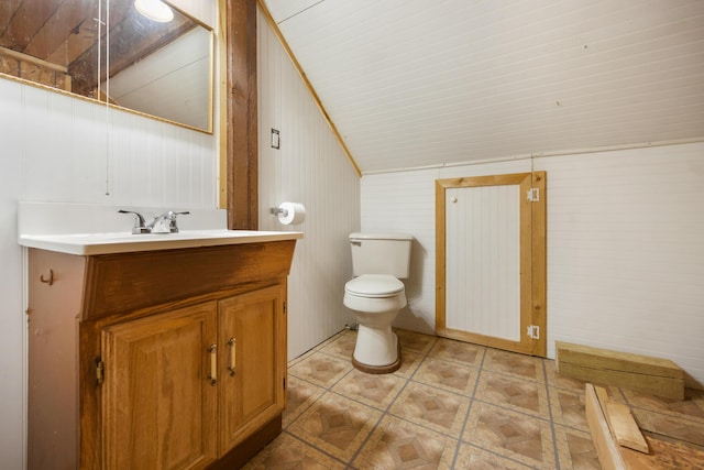 36 Palmer Rd, Etna, ME 04434 - bathroom featuring vanity and vaulted ceiling