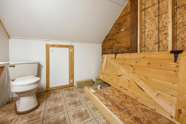 36 Palmer Rd, Etna, ME 04434 - bathroom with lofted ceiling and wood walls