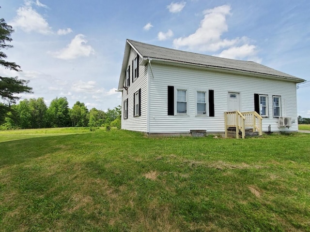 523 Exeter Rd, Corinth, ME 04427 - back of property featuring a lawn