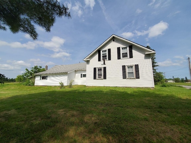523 Exeter Rd, Corinth, ME 04427 - view of property exterior featuring a lawn