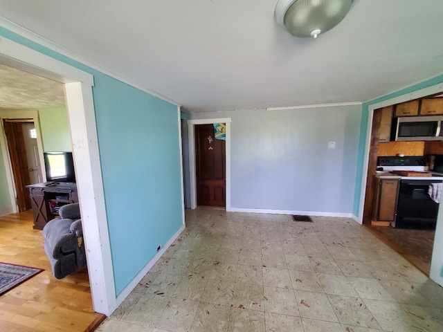523 Exeter Rd, Corinth, ME 04427 - living area featuring baseboards and crown molding