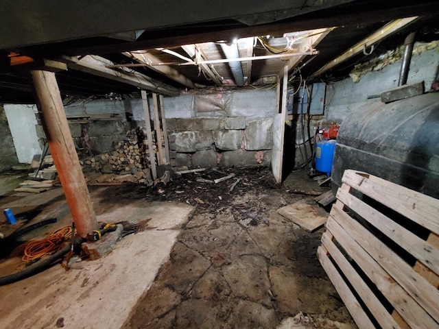 523 Exeter Rd, Corinth, ME 04427 - unfinished below grade area featuring electric panel and a water pressure tank