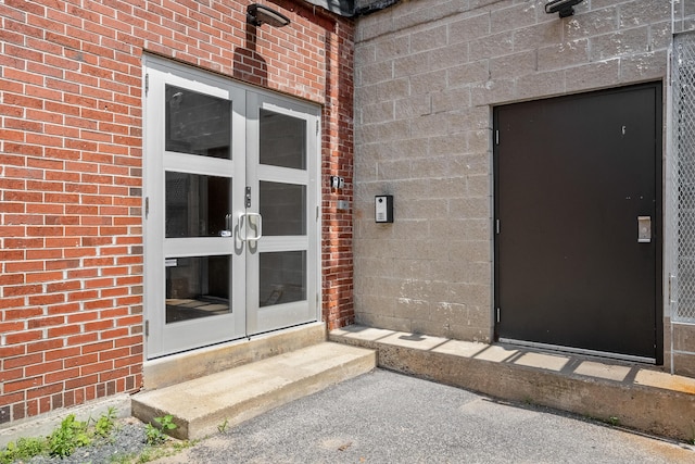 273 Congress St Unit 1, Portland, ME 04101 - doorway to property featuring french doors and brick siding