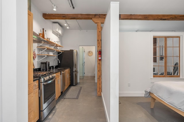 273 Congress St Unit 1, Portland, ME 04101 - kitchen with stainless steel appliances, dark countertops, finished concrete floors, rail lighting, and open shelves
