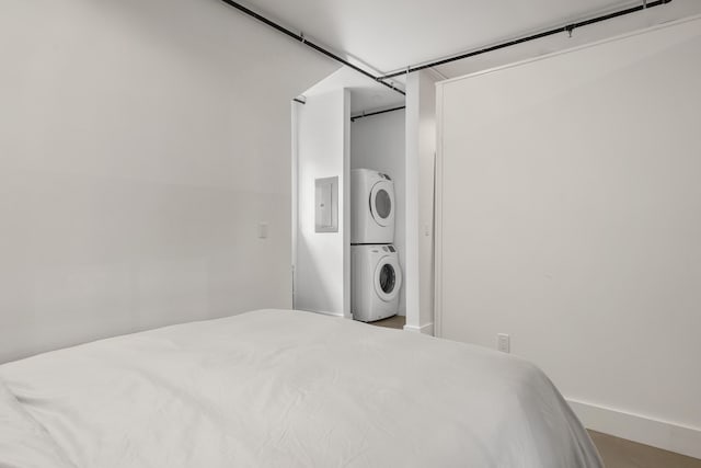 273 Congress St Unit 1, Portland, ME 04101 - bedroom with estacked washer and dryer and electric panel
