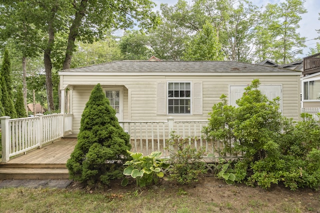 9 Sarah Ln, Standish, ME 04084 - view of front of home featuring a deck and a shingled roof