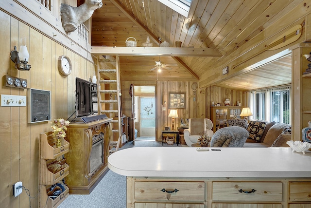 9 Sarah Ln, Standish, ME 04084 - kitchen with wooden walls, light countertops, open floor plan, ceiling fan, and wooden ceiling