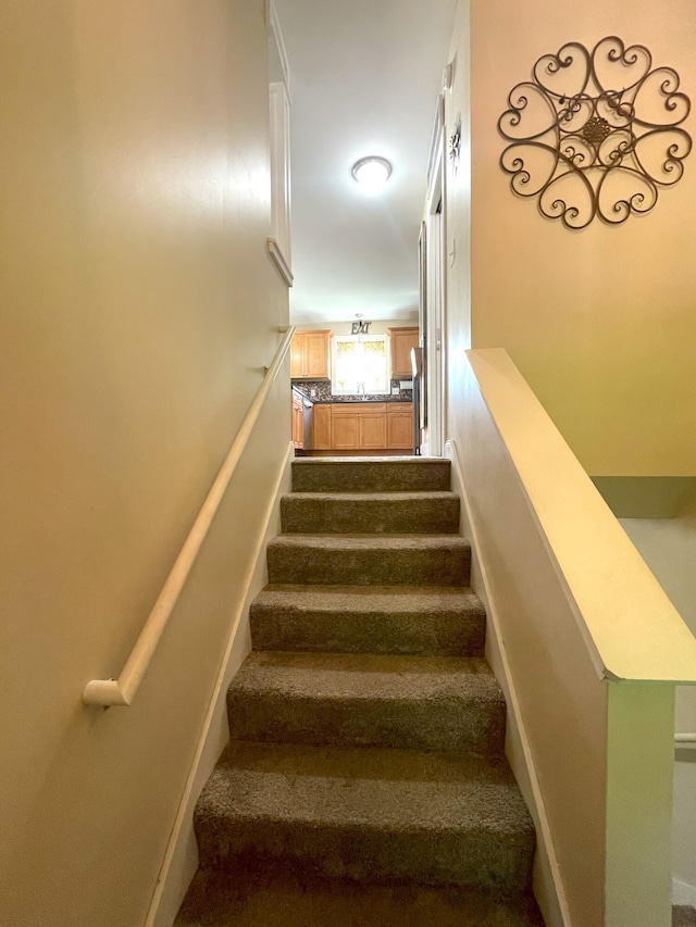 28 Kayla Way, Gorham, ME 04038 - staircase with baseboards and carpet floors