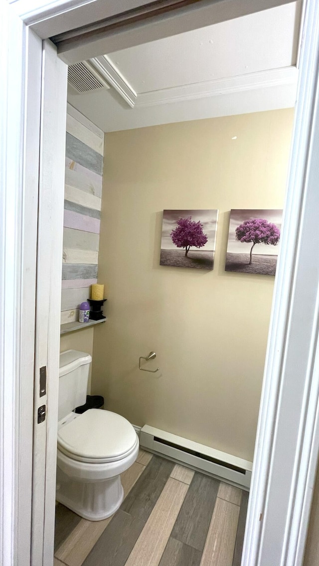 28 Kayla Way, Gorham, ME 04038 - bathroom with baseboard heating and wood finished floors
