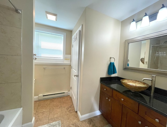 28 Kayla Way, Gorham, ME 04038 - full bathroom featuring a baseboard heating unit, vanity, and shower / bathtub combination