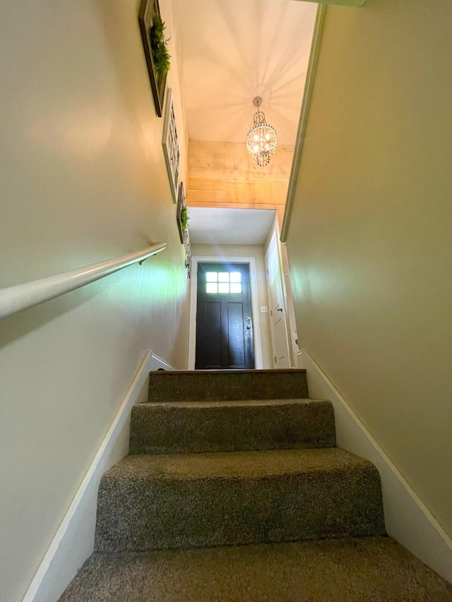 28 Kayla Way, Gorham, ME 04038 - stairs featuring a chandelier