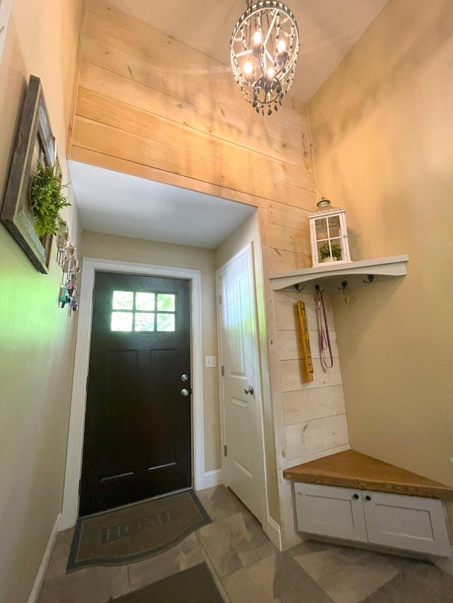 28 Kayla Way, Gorham, ME 04038 - mudroom with wood walls and a chandelier
