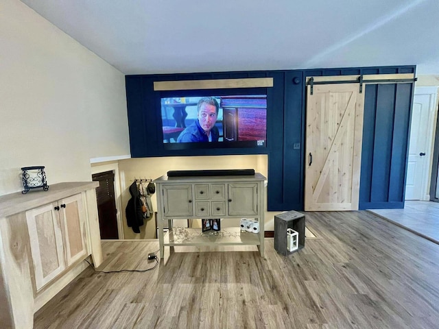 28 Kayla Way, Gorham, ME 04038 - living room featuring wood finished floors and a barn door