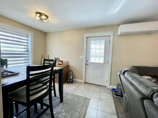 28 Kayla Way, Gorham, ME 04038 - dining room with a wall mounted air conditioner, plenty of natural light, and light tile patterned flooring