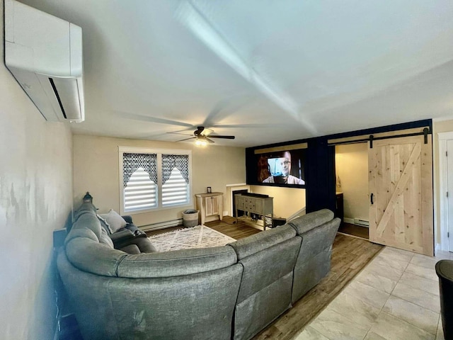 28 Kayla Way, Gorham, ME 04038 - living room with an AC wall unit, a baseboard heating unit, ceiling fan, and a barn door
