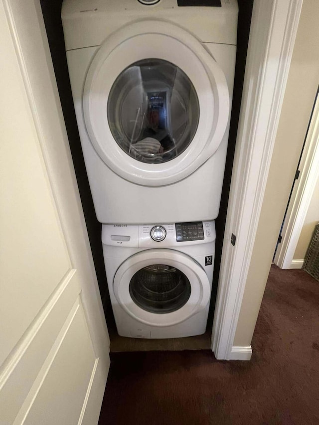 28 Kayla Way, Gorham, ME 04038 - laundry room with estacked washer and dryer and dark colored carpet