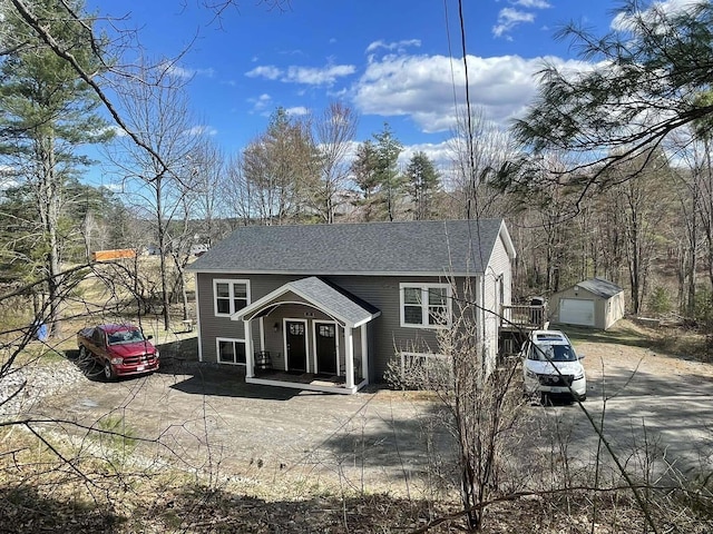 28 Kayla Way, Gorham, ME 04038 - back of house featuring an outbuilding and a shingled roof