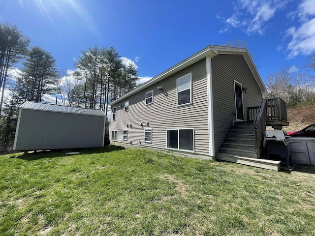 28 Kayla Way, Gorham, ME 04038 - back of house with a yard, an outbuilding, and stairway