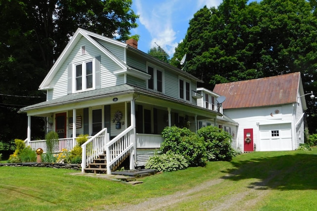 10 Liberty St, Dexter, ME 04930 - farmhouse with a chimney, a porch, a garage, and a front lawn