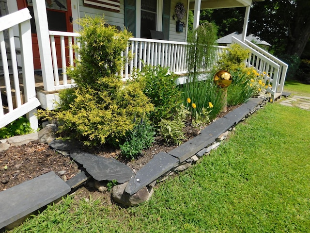 10 Liberty St, Dexter, ME 04930 - view of grassy yard with covered porch