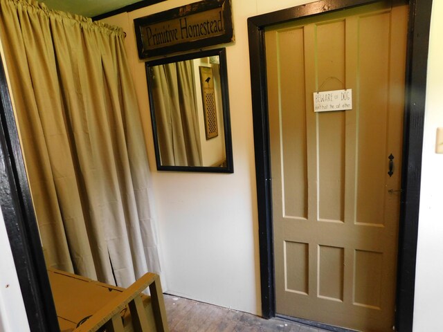 10 Liberty St, Dexter, ME 04930 - corridor featuring wood finished floors