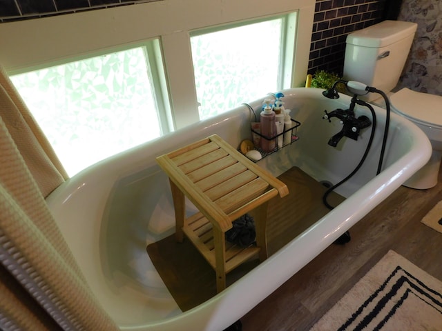 10 Liberty St, Dexter, ME 04930 - detailed view of a bath and wood finished floors