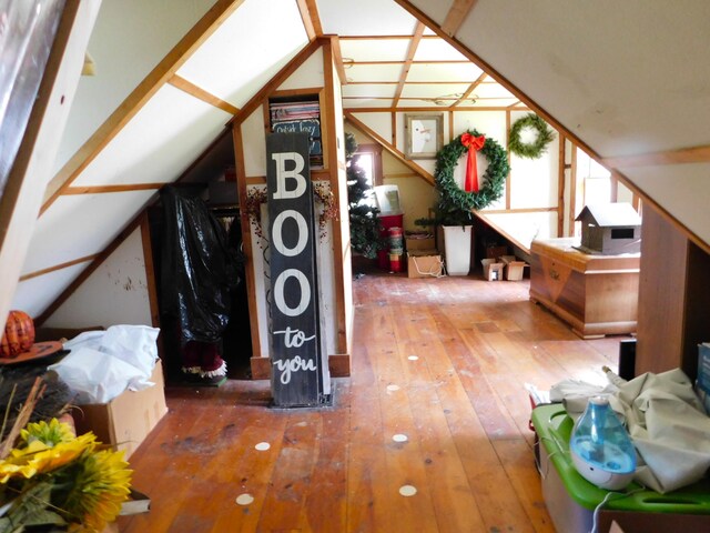 10 Liberty St, Dexter, ME 04930 - additional living space with hardwood / wood-style floors and vaulted ceiling