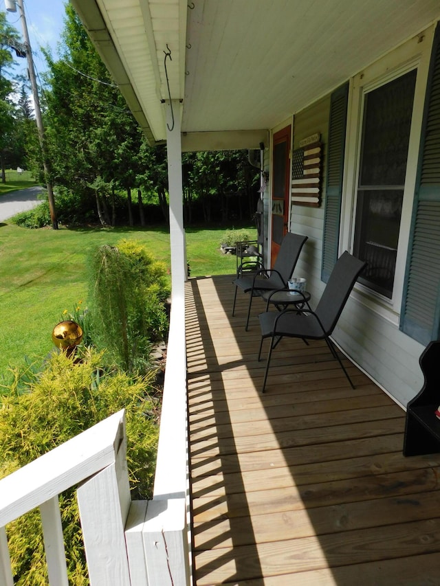 10 Liberty St, Dexter, ME 04930 - porch featuring a lawn