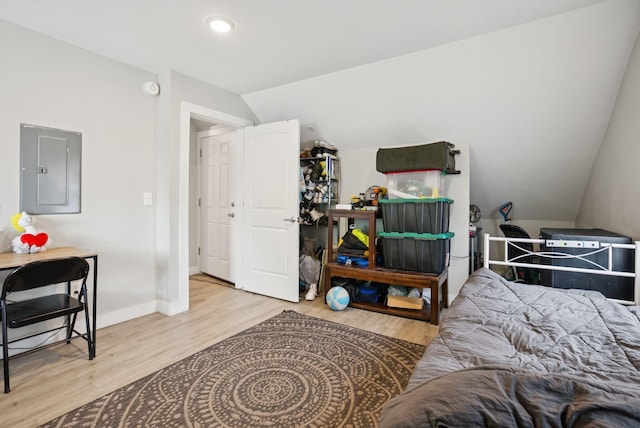 26 Cross St, Westbrook, ME 04092 - bedroom with electric panel, wood finished floors, lofted ceiling, and recessed lighting